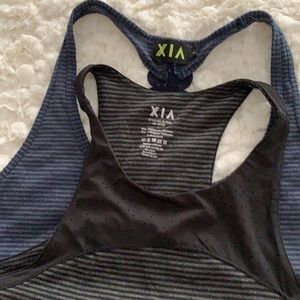 (Bundles) 2 (XIA) Woman’s tops size L